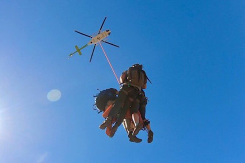 Some of the hacking team being airlifted to difficult-to-reach places in the Western Cape mountains